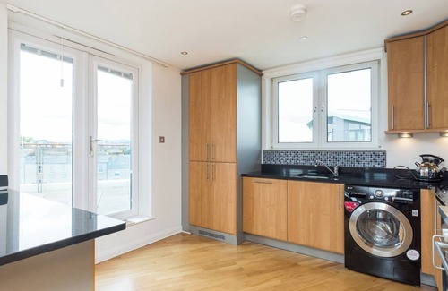 Newhaven Apartment | Portland Gardens [403] is a Modern 3 bedroom penthouse apartment in vibrant Leith
