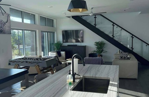 Central East Austin Apartment | PreGame penthouse rooftop patios and firepits
