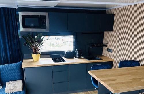 Herrenwyk Boat Rental | Premium Houseboat Blue Lagoon