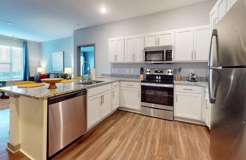 Coliseum Central Apartment | Prime Hampton Stay at Ellipse Urban: Near Shopping, Dining and Entertainment