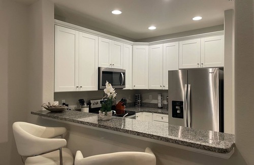 Pelican House | PRISTINE 1ST FLOOR 2 BEDROOM 2 BATH VILLA CLOSE TO EVERYTHING!