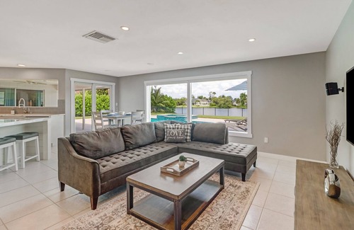 Palm River Estates House | Pristine Lake Home, Heated Pool, Gas Fire Pit, Fenced Yard