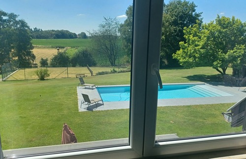 Limelette Apartment | private apartment in a bucolic setting with outdoor heated pool and tennis court