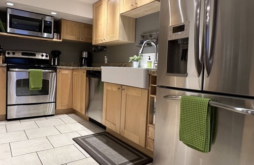 Olympus Cove House | Private Basement Apartment in Olympus Cove with EV Charger