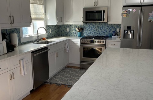 Silver Beach House | Private heated pool and spacious yard. 5 minute walk to the beach.