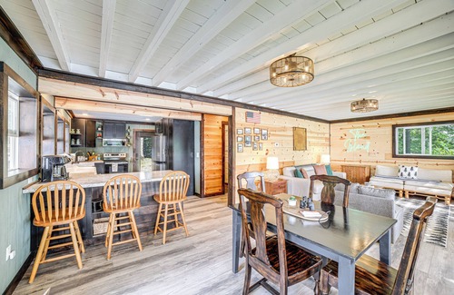 Smyrna Cabin | Private Island: Home in Belding w/Dock & Grill!