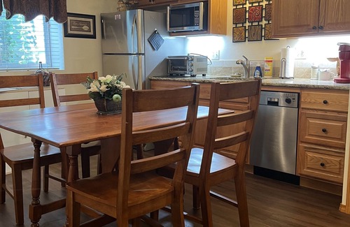 Briargate House | Private, Spacious Basement Suite - Hot Tub, A/C, Ping Pong, Family-Friendly