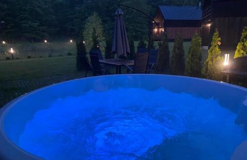 Suleczyno House | Przystanek Kistówko komfortowe domki z jacuzzi, staw wędkarski, kominek, las, przestrzeń