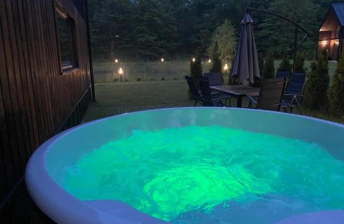Suleczyno House | Przystanek Kistówko komfortowe domki z jacuzzi, staw wędkarski, kominek, las, przestrzeń