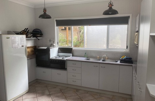 Orchid Beach House | Ques R & R at Orchid Beach. Water views with sea breeze. Relaxing Holiday House.