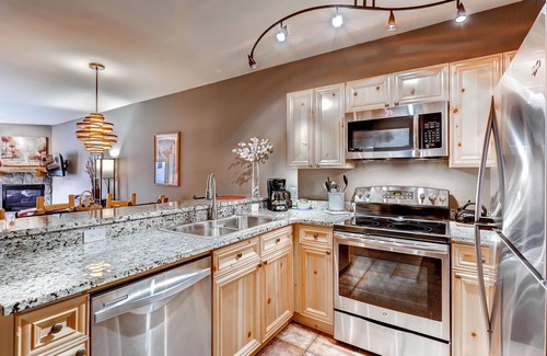 Mountain House Condo | Quick walk to Keystone lifts, heated garage parking & convenient access.
