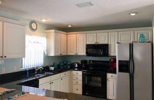 Virginia Trace House | Quick walk to Lake Sumter Landing! Gas Golf Cart Included!