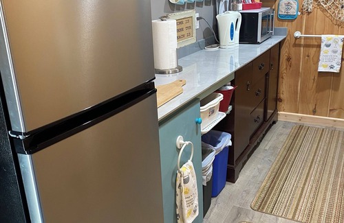 Port Burwell Apartment | Quick walk to the beach, or launch a Kayak or Canoe right out back.