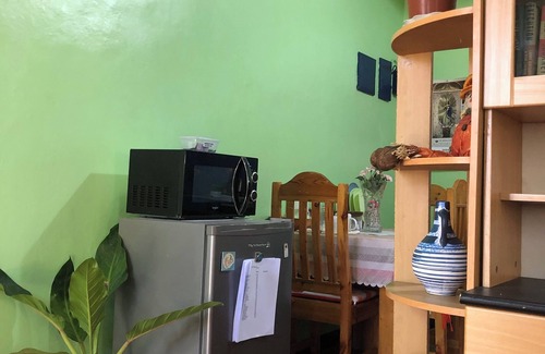 Bacoor City House | Quiet Garden Home, 1 bedroom with attic in Bacoor with WiFi, AC. Book now