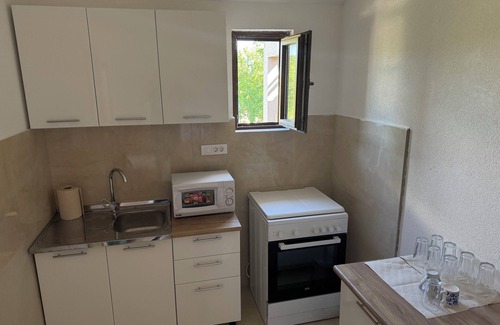 Radanovici Apartment | Quiet, safe stay with free parking,n20 min drive from Kotor, Tivat or Budva!