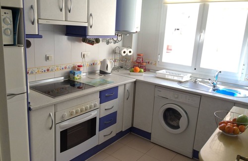 Roquetas de Mar Apartment | Quiet sunny apartment, 3 min walk to beach, communal pools, terrace, WIFI A/C TV