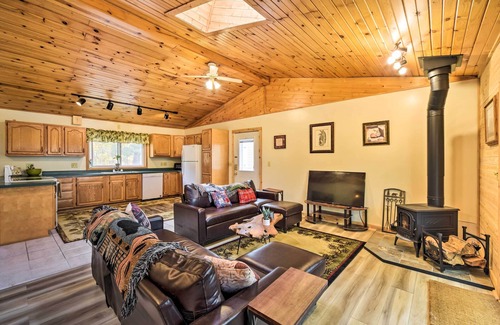 Dresser Cabin | Quiet Waterfront Round Lake Home w/Hot Tub
