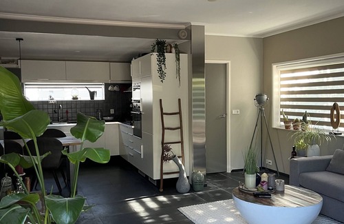 Bruinisse House | Quietly located corner house in Zeeland with generous south-facing terrace