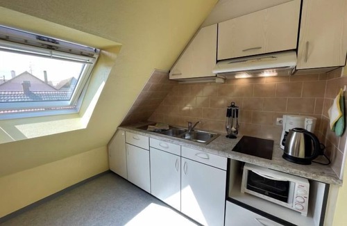 Marckolsheim Apartment | Résidence jaune et rose by Interhome