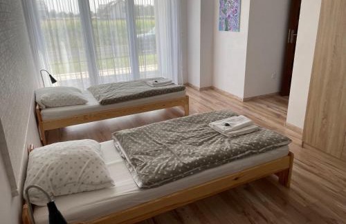 Czarnowasy House | Różana 51