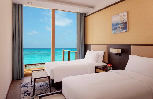 Huruelhi Island Resort | Radisson Blu Resort Maldives with 50% off on Sea Plane round trip SPA 03 nights & above