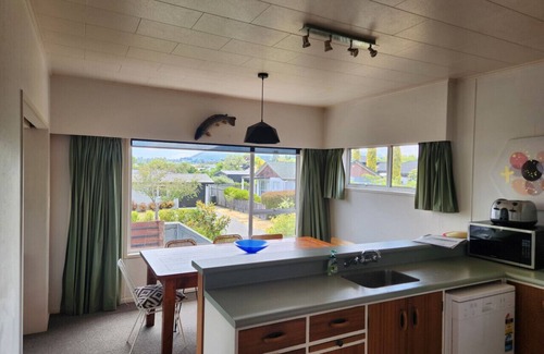 Rainbow Point House | Rainbow Point Pad - Large elevated bach with lake and mountain views, Free WiFi