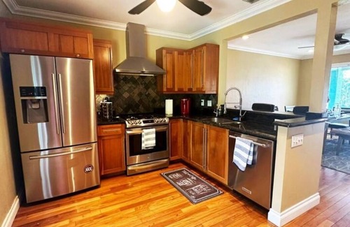 Poinsettia Heights House | Rated top 5% of homes. 3BR 3BA Private Oasis Home with Heated Salt Water Pool.