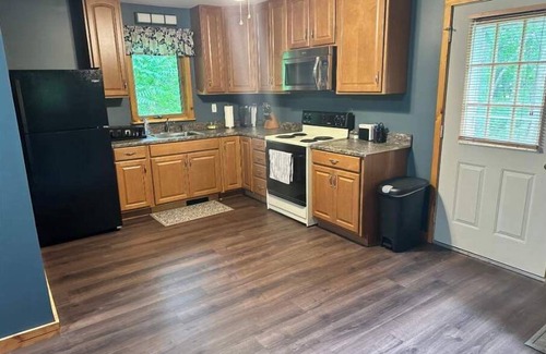 Huntingdon House | Raystown lake close to boat launch and all amenities wooded paradise
