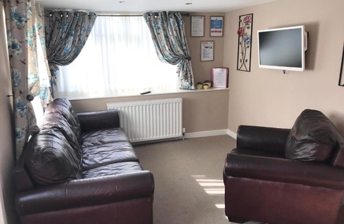 Stepps Resort | Red Deer Village Holiday Park - 2 Bedroom, Self-Catering Chalet