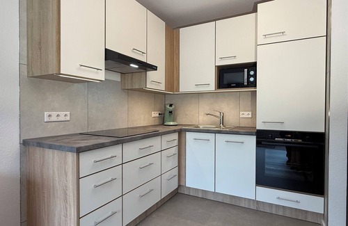 Busumer Deichhausen Apartment | Reethaus Seeschlößchen, apartment Westmöwe, only 200m to the beach