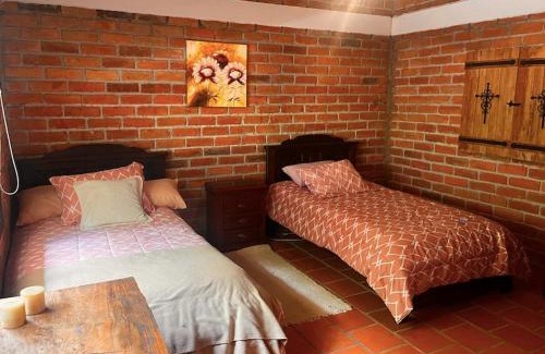 Chiquintad House | Refugio de las Nubes