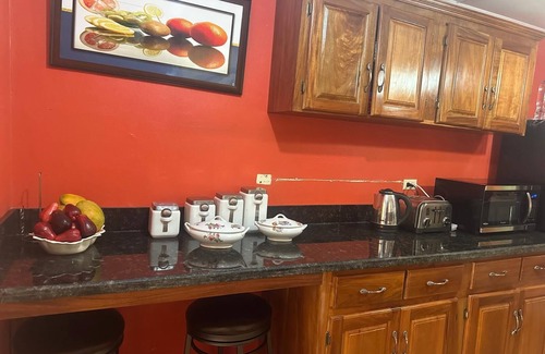 Stewart Town House | Relaxed Comfort in the Heart of Brown’s Town in a lovely 3-bdrm bungalow w/WiFi