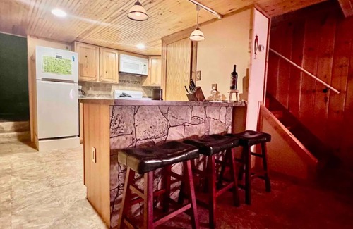 Manitou Beach House | Remodeled cozy retreat with a lake front view on Devils Lake. Pet Friendly!