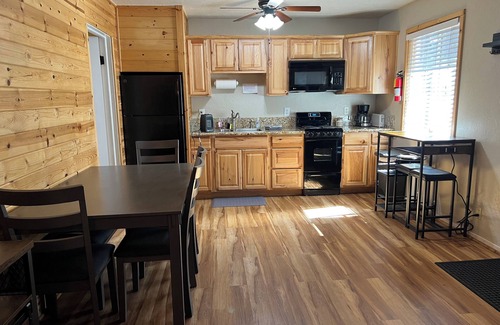 Peninsula Village Cabin | Remodeled cozy 2-bedroom cabin, pet friendly, free boat launch & slip, lakeside