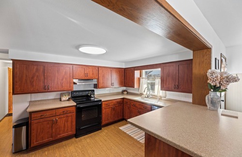 Delafield House | Remodeled Home on Wooded Nagawicka Lake Channel