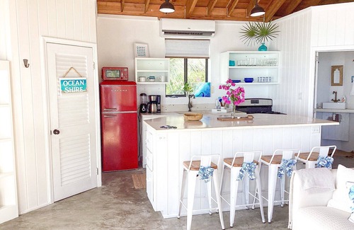 Rainbow Bay House | Remodeled Oceanfront Cottage Directly on the Warm Calm Caribbean