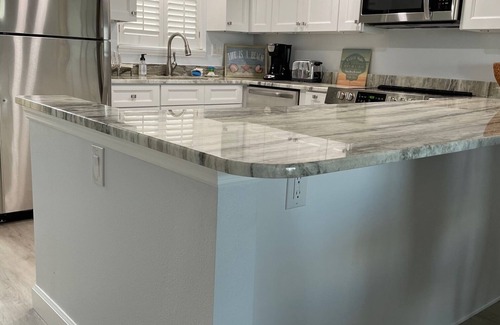 New Smyrna Beach Condo | RENOVATED 1st FLOOR DIRECT OCEANFRONT CONDO - Just steps from the beach and pool