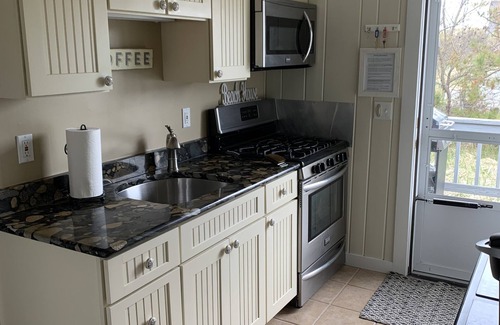 Sagamore Beach House | Renovated 2 bedroom left side of a duplex home with beach across the street