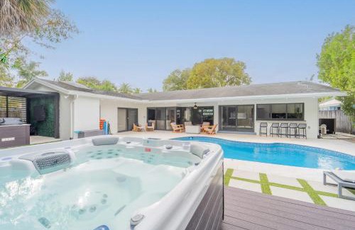 Imperial Point House | Resort Style Backyard Heated Pool Hot Tub Fire Pit