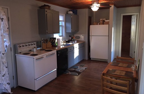 Wilburn Cabin | Riverfront Cabin on Exclusive Jon's Pocket!