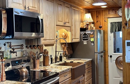 Indian River Cottage | Riverfront Cottage w/Boat Docking and easy access to Burt Lake