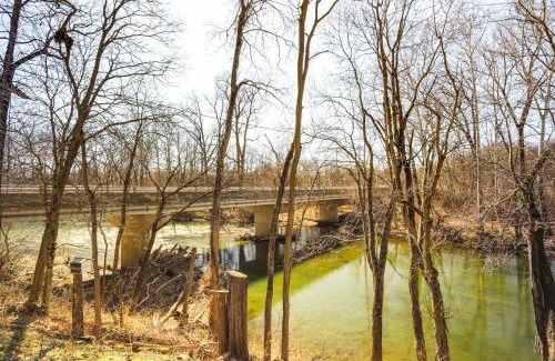Covington House | Riverfront Covington Cabin with Deck and Fire Pit!