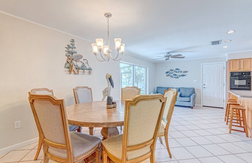 Venetian Way House | Riverfront home with private heated pool, dock, AC & W/D - dog-friendly