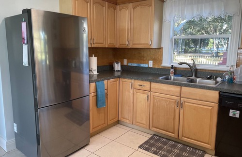 Sebastian Cottage | Riverfront home with a boat dock, WiFi, AC