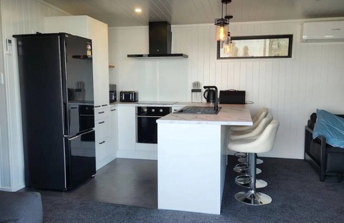Waerenga Cabin | Romantic Countryside Cabin with Magnificent Lake Views