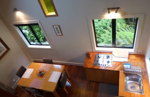 Mangawhai Apartment | Romantic eco cottage retreat for two amidst quiet, private native bush setting.