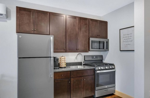 Berlin Apartment | Romantic Getaway with Private Patio and Hot Tub on Main Street - Magnolia Suite