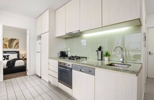 Docklands Apartment | Rooftop Pool 2BR Apt at Marvel Stadium with Free Parking