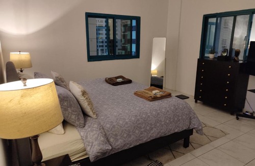 Al Majaz House | Room for Rent in a Family Apartment- Waterfront View