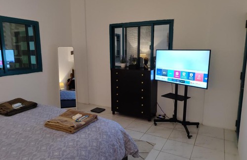 Al Majaz House | Room for Rent in a Family Apartment- Waterfront View